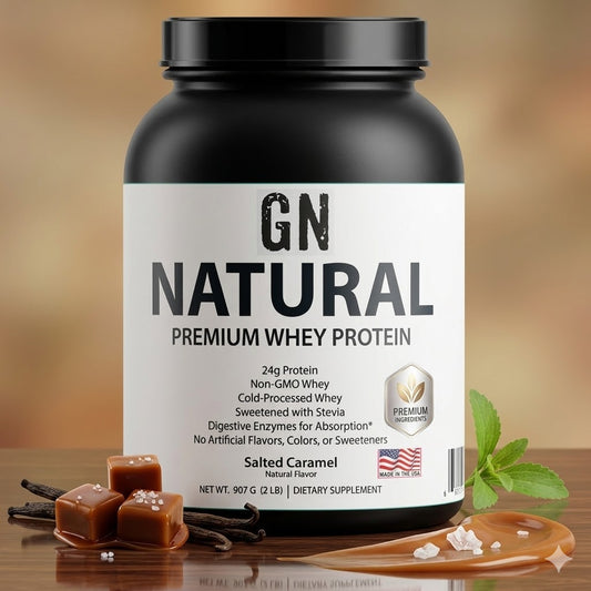 GN Natural Premium Whey Protein container with vanilla beans and caramel pieces on a wooden surface.