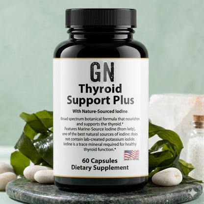 Supplement bottle labeled 'GN Thyroid Support Plus' on a green background with seaweed and stones.